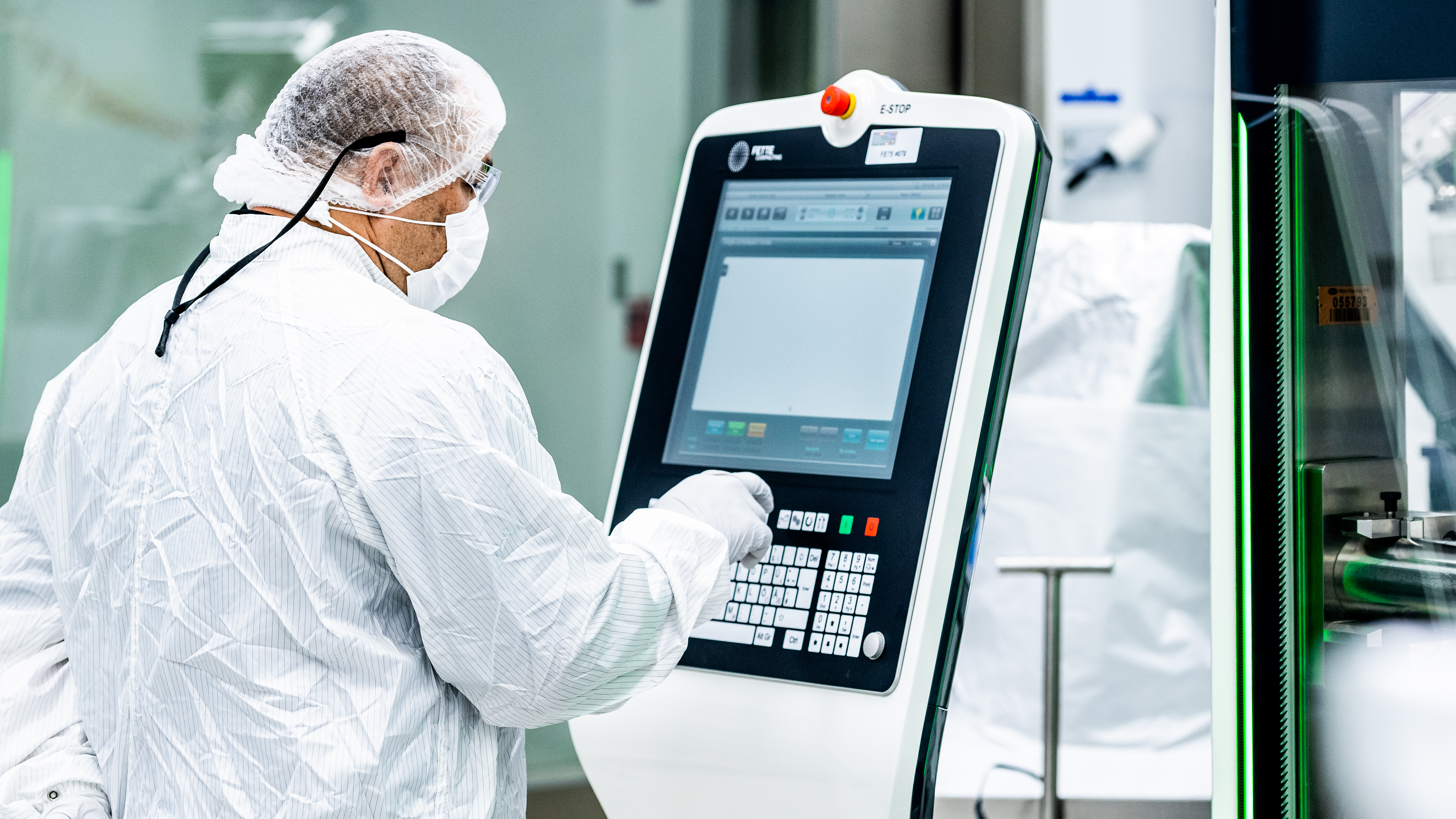 Image of person in lab. Ensuring patient safety and quality.