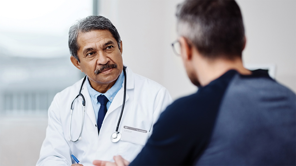 Image of healthcare professional and patient.