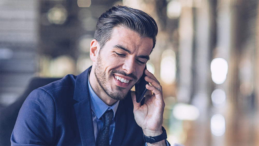 Image of man speaking on mobile phone.