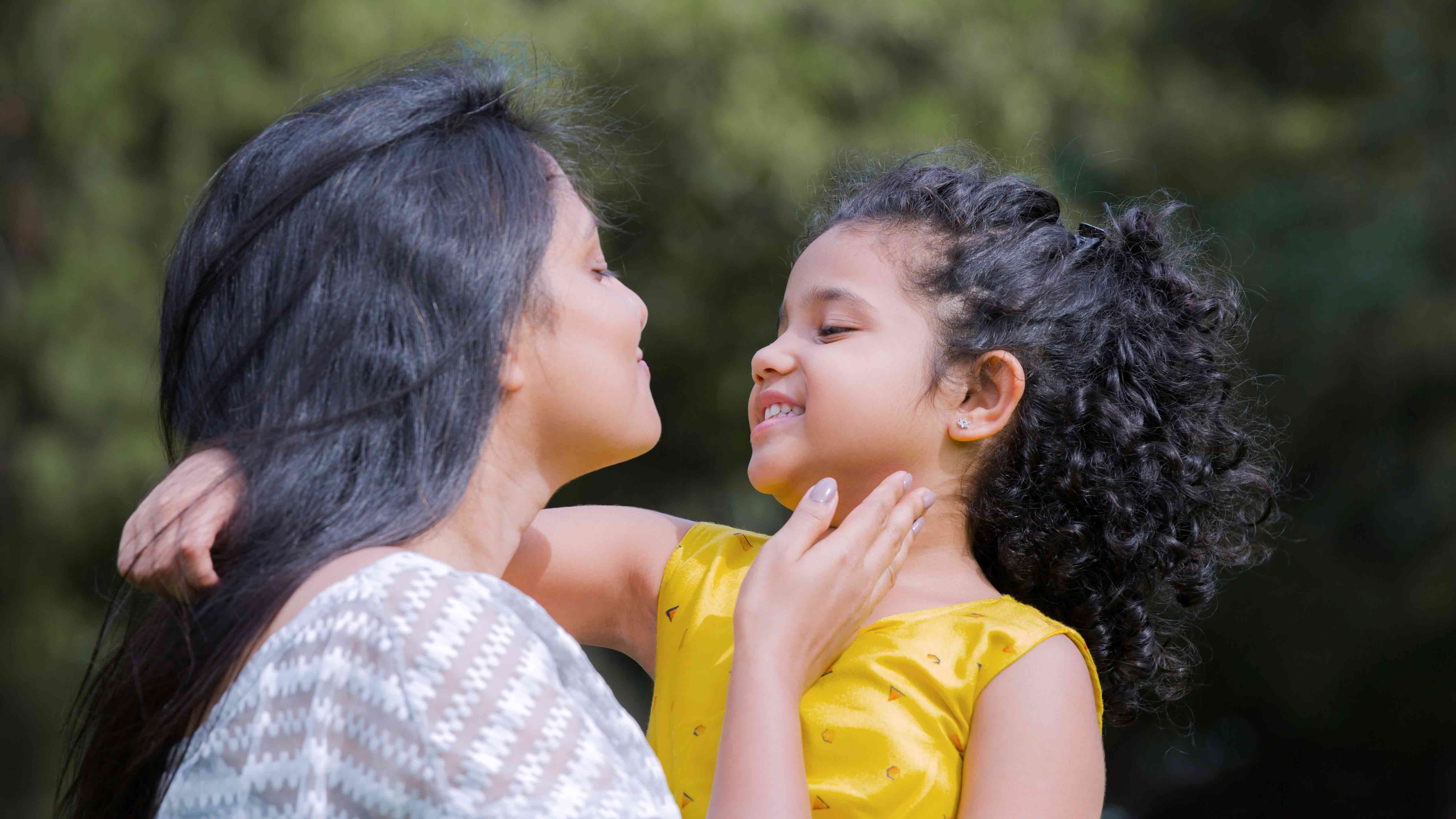 Woman and child looking at each other