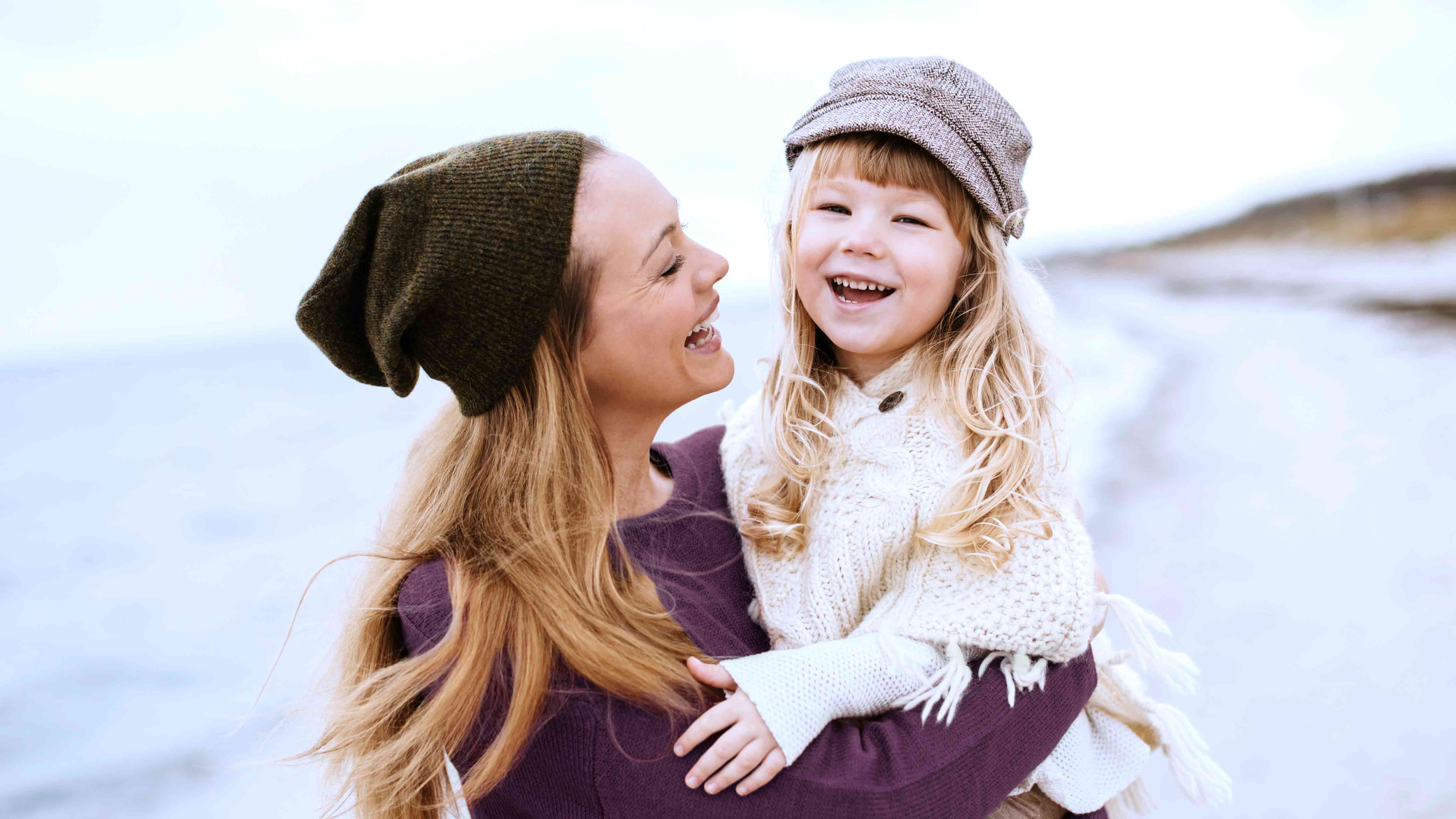 Woman with child in the snow