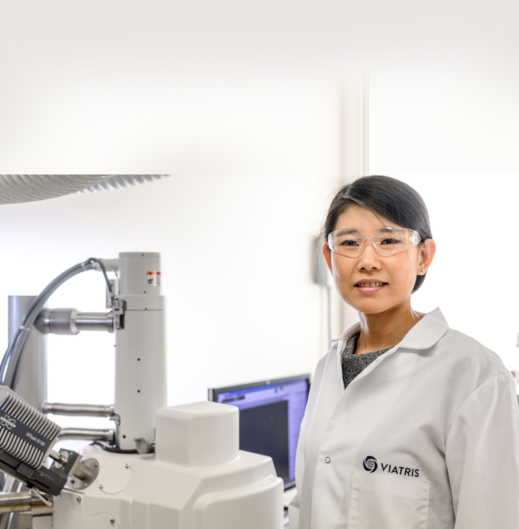 Woman in lab coat.  Celebrating women in science